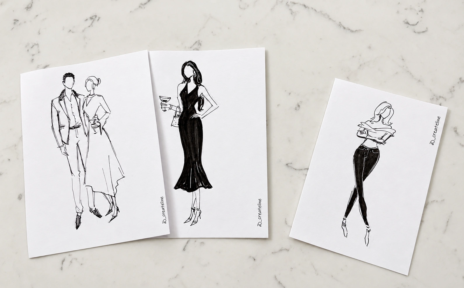Three paper cards with black-and-white full-body fashion sketches: a couple, a woman in a black dress and a woman in trousers, all with deliberately blank faces