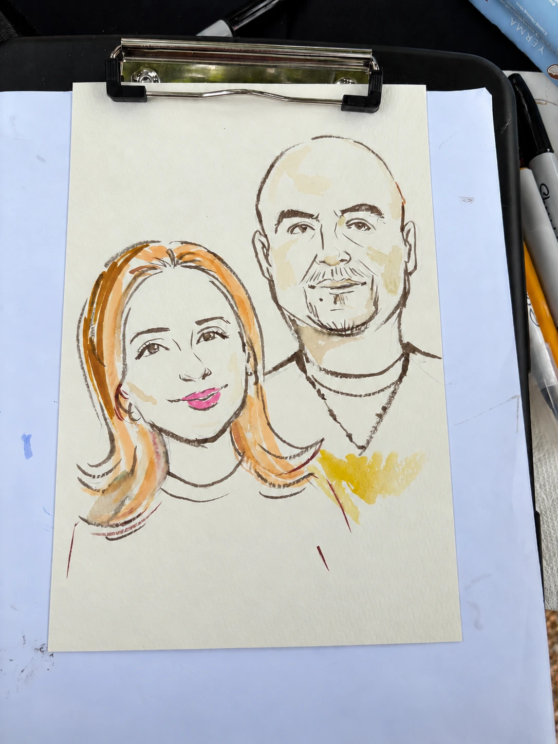 Original paper portrait of a couple with warm watercolor accents