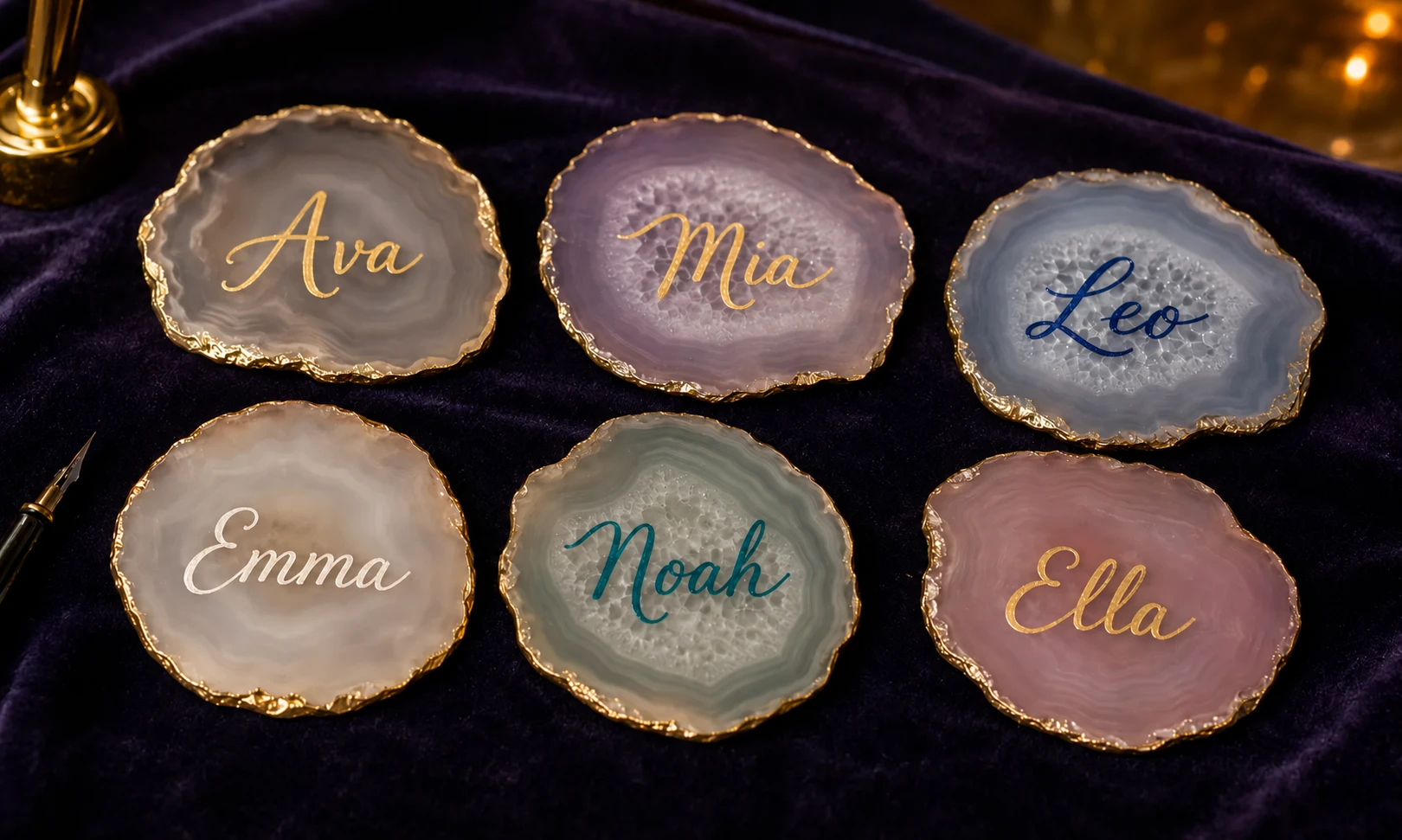 Six gold-edged agate keepsakes personalized with hand-lettered names