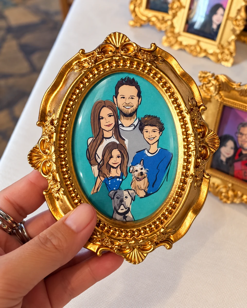Family portrait in a small gold frame held in a hand